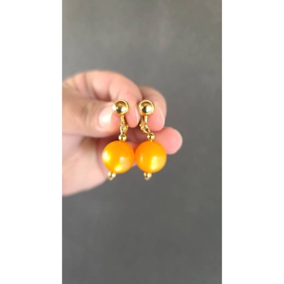 Celebrity Orange Dangling Clip-on Earrings - Picture 5 of 10